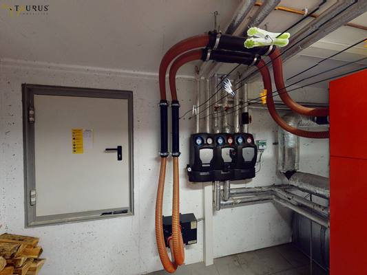 Heizraum und Pelletslager im Keller des Nachbarn