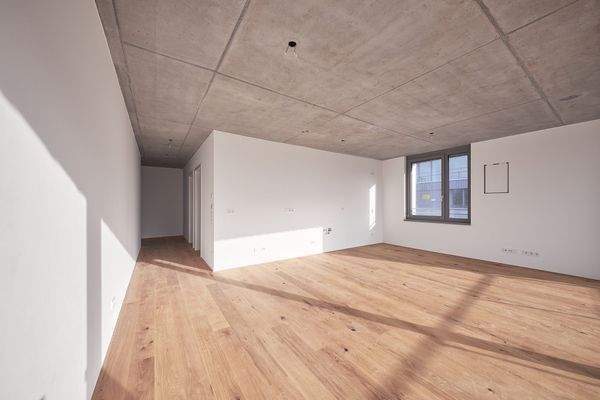 Wohnküche mit Blick zur Küchenzeile - HERDERGÄRTEN 2.4.2