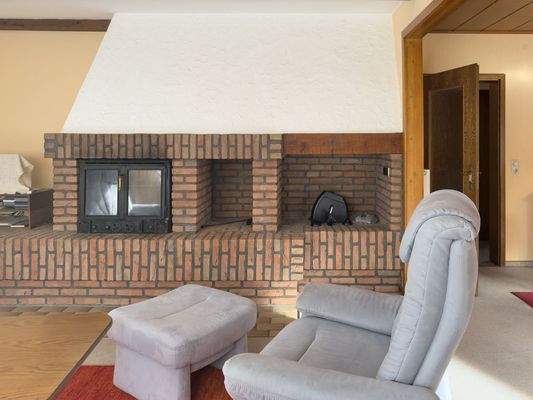 Wohnzimmer mit Kamin 