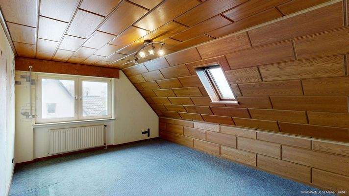 Wohnlich ausgebaute Nutzfläche im Dachgeschoss