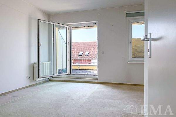 Schlafzimmer mit Zugang zur Dachterrasse