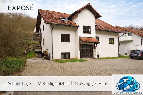 Elegantes Haus in grüner Umgebung.png