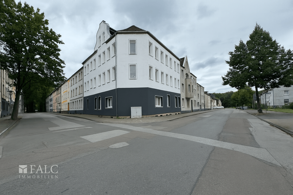 A_photograph_captures_a_daytime_street_scene_at_th