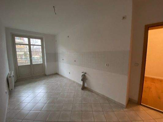 Küche mit Fliesenspiegel.jpg