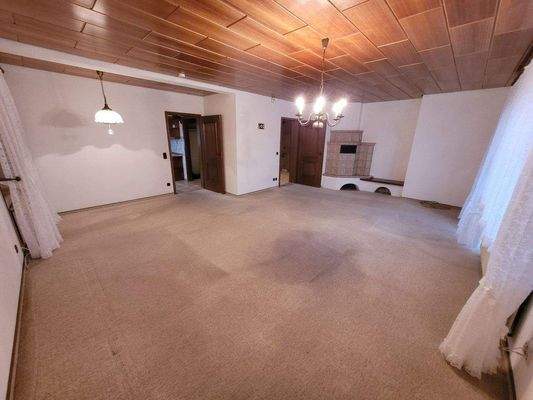 EG Wohnzimmer mit Kachelofen