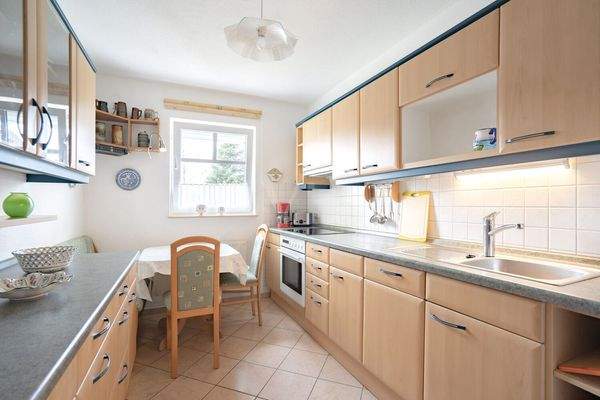 Küche mit Einbauküche 