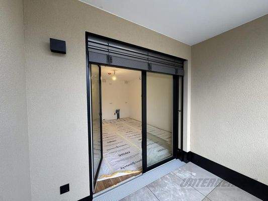 Loggia Blick in Wohnzimmer