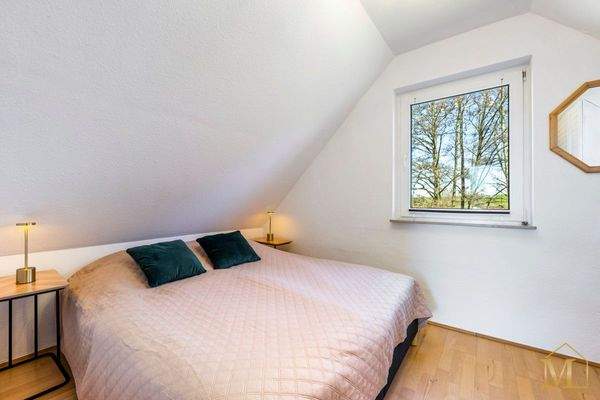 Schlafzimmer mit Doppelbett