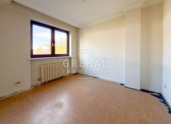 Eines der Zimmer im OG