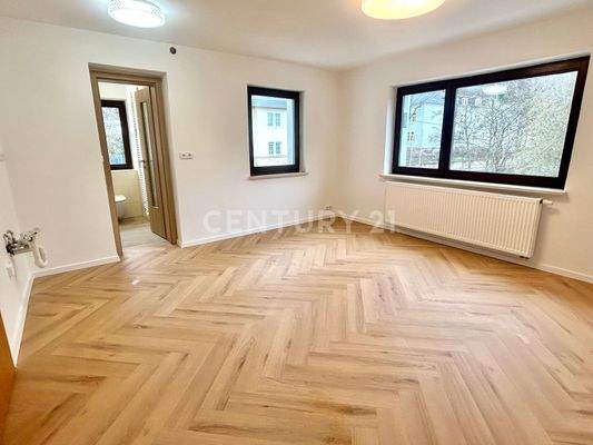 Wohnzimmer im 1. OG - sanierte Einheit