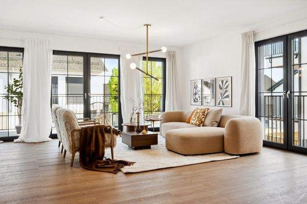 Großzügiger Wohnbereich mit Zugang zur Terrasse