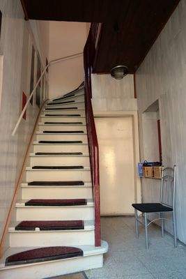 Treppenhaus mit Aufgang zum Obergeschoss