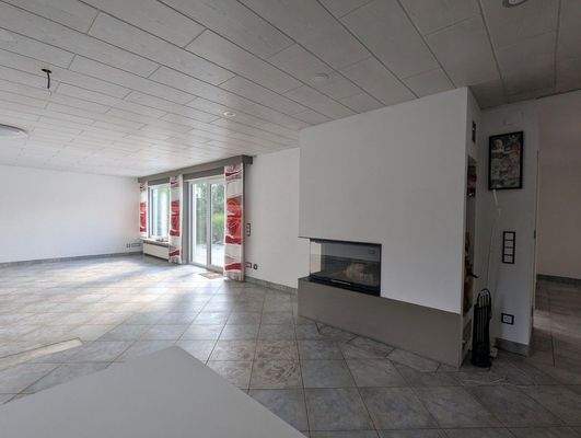 Wohn-/Esszimmer mit Kamin