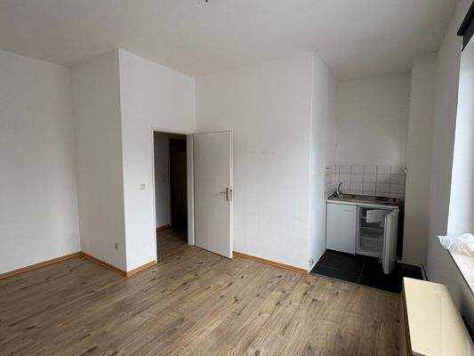 Zimmer mit Küchenzeile