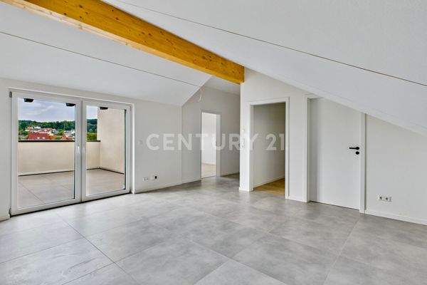 Wohn- / Essbereich mit Zugang zum Balkon