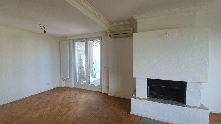 Wohnzimmer mit Kamin