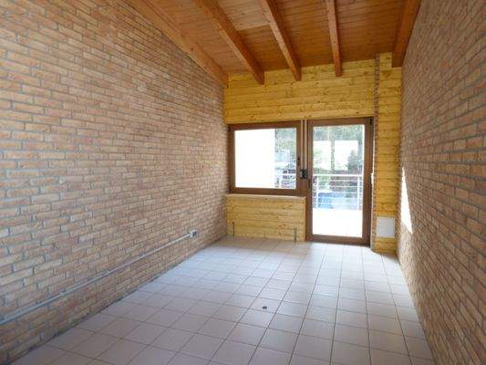 Wintergarten mit Zugang zum Balkon