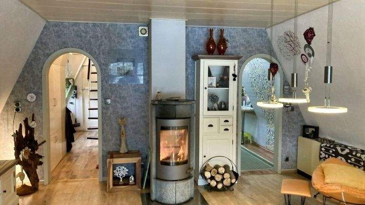 Wohnzimmer mit Kamin