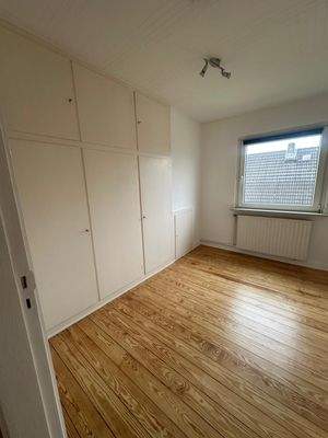 Schlafzimmer mit Einbauschrank