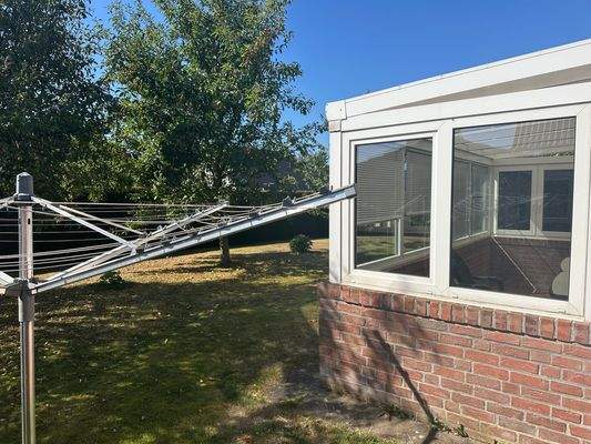 Wintergarten mit Gartenblick