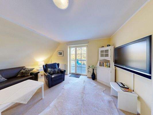 Wohnzimmer mit Zugang zur Dachterrasse im Dachgeschoss - Wohnung 3