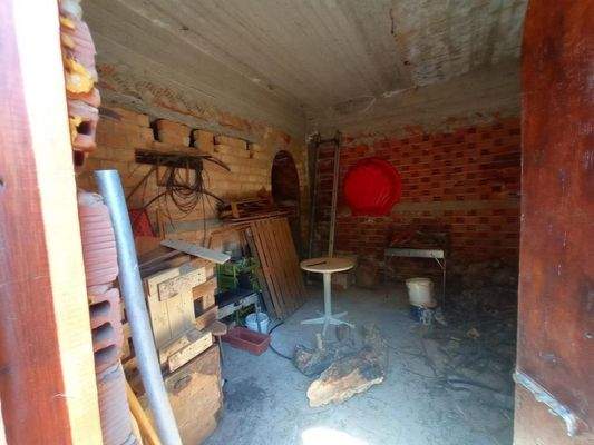 Kreta, Neapoli: Großes Steinhaus mit unvollendetem Gästehaus, Olivenhain und Garten zu verkaufen