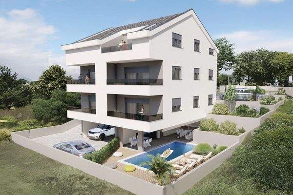 Modernes Apartmenthaus mit Pool, Terrassen und begrüntem Außenbereich