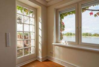 Rhein und Gartenblick