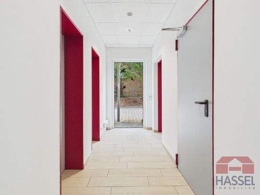 Zu den Sanitärräumen