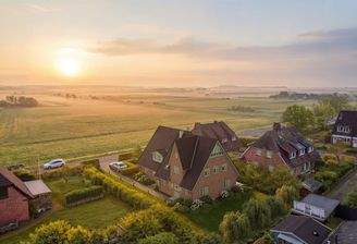Luftbild mit Neubau-Visualisierung