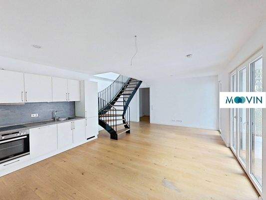 Ansicht I: Wohn- und Esszimmer mit offenem Küchenbereich