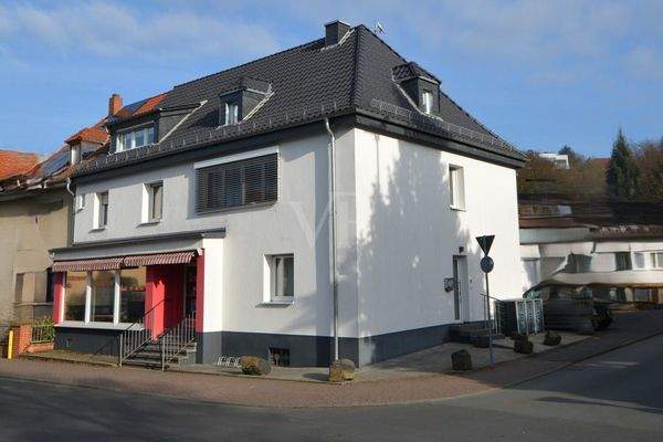 Ladenlokal mit Wohneinheiten