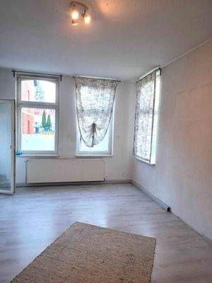 Zimmer mit Balkonzugang