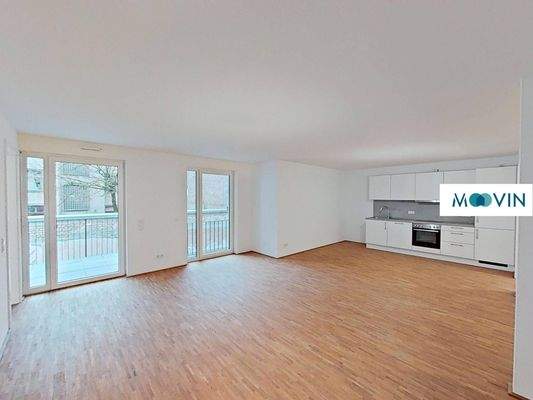 Ansicht I: Wohn- und Esszimmer mit offenem Küchenbereich