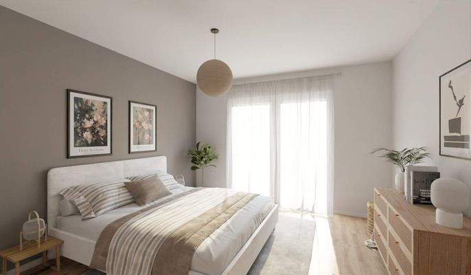 Das Schlafzimmer bietet einen direkten Zugang auf den Balkon