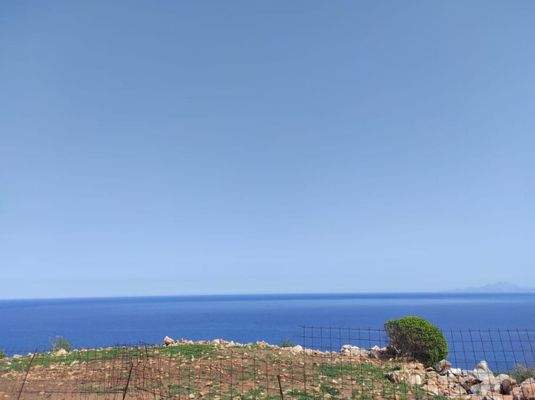 Kreta, Omprogialos: Grundstück mit unverbaubarem Meerblick zu verkaufen