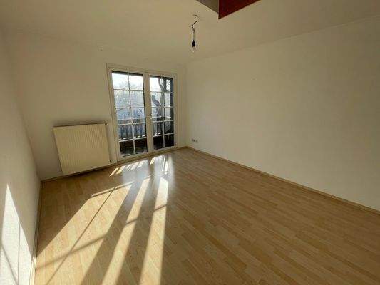 Wohnzimmer mit Balkon und Galerie