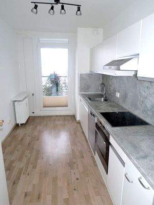 Die Küche mit Einbauküche