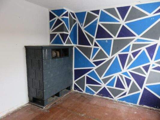 Wohnzimmer mit Kachelofen