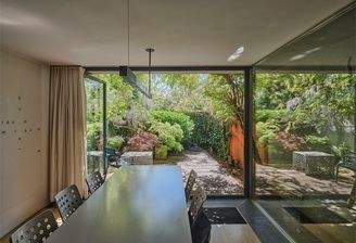 WHG 03-Wohnzimmer Blick Garten