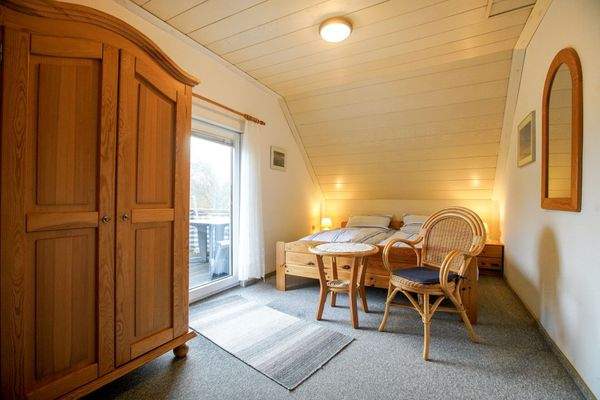 Zimmer im DG mit Zugang zur Dachterrasse