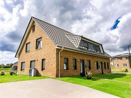 Direkter Zugang zum hinteren Gartenbereich.