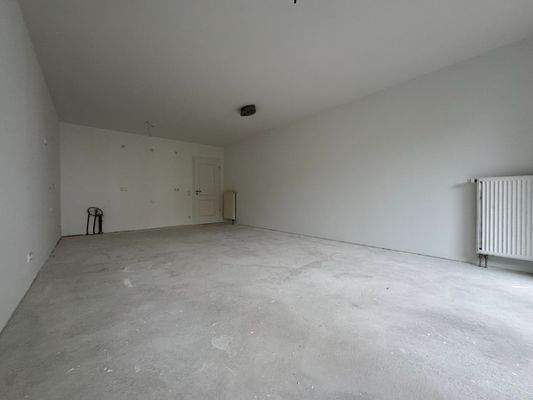 Wohnzimmer mit offener Küche Bild 4