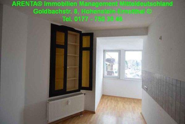 Küche mit Einbauschrank