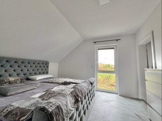 Gemütliches Schlafzimmer (DG)