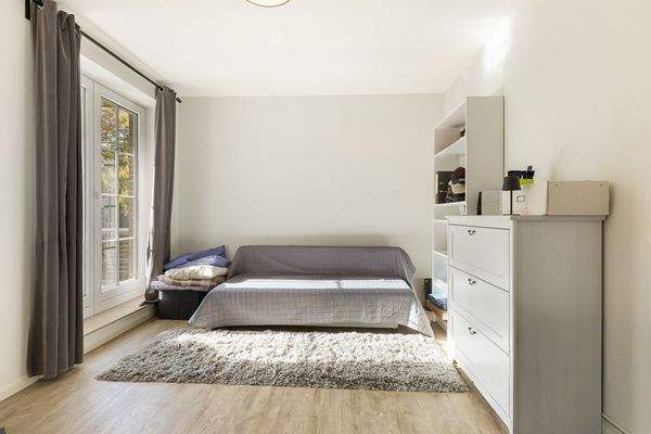 Schlafzimmer mit Balkonzugang