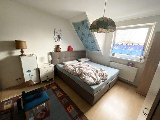 Zimmer der Dachgeschosswohnung