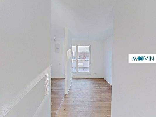 Ansicht V: Wohn- und Esszimmer mit offenem Küchenbereich