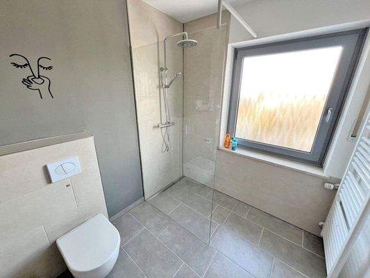 Mit Handtuchheizkörper