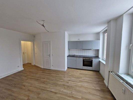 Wohnzimmer mit Küche